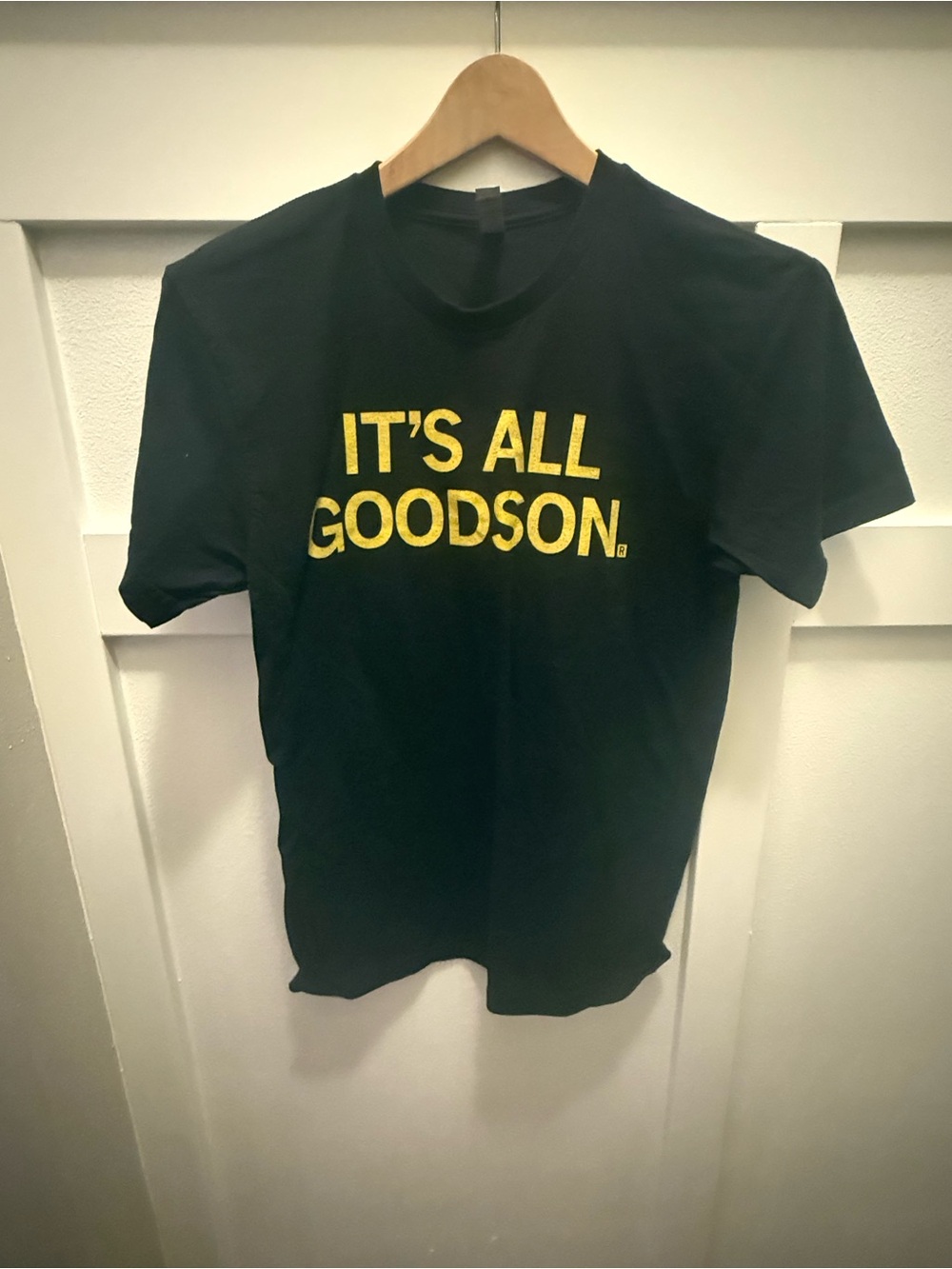 Next Level Apparel Black Tee with Yellow Front Text Graphic